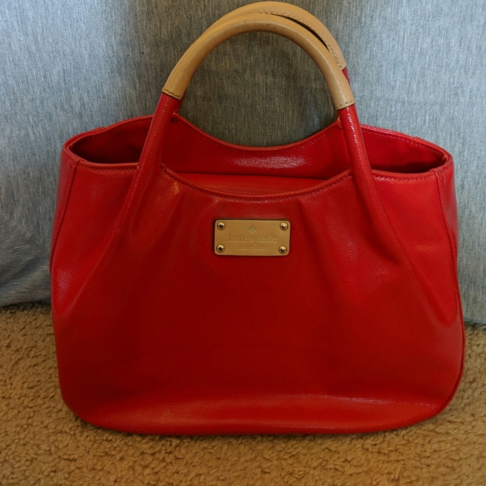 Bright red Kate Spade bag/w/ feet/ snap close